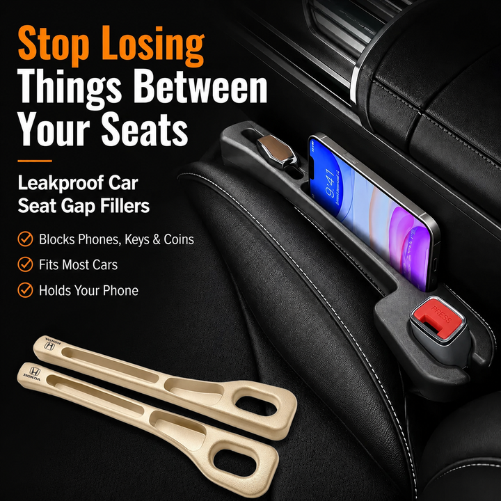 Beige car seat gap fillers installed beside a black car seat with a phone and keys in the storage slots.